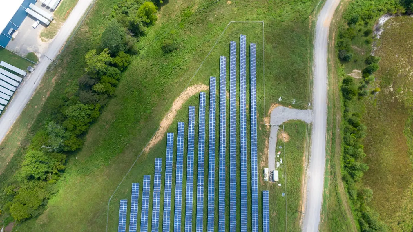 Aeiral image of the solar panels on green grass